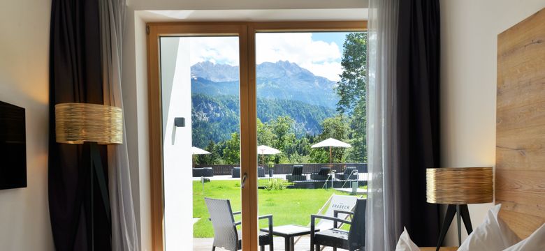 DAS GRASECK - mountain hideaway & health care: Basic room sunny side with balcony/terrace image #6