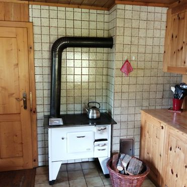 kitchen with wood-burning stove, Amberger Hütte, Paternion-Fresach, Nockregion, Carinthia , Austria