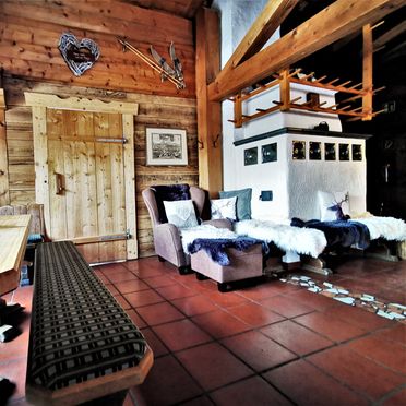 living area with tiled stove, Heideggalm, Forstau, Salzburg, Austria